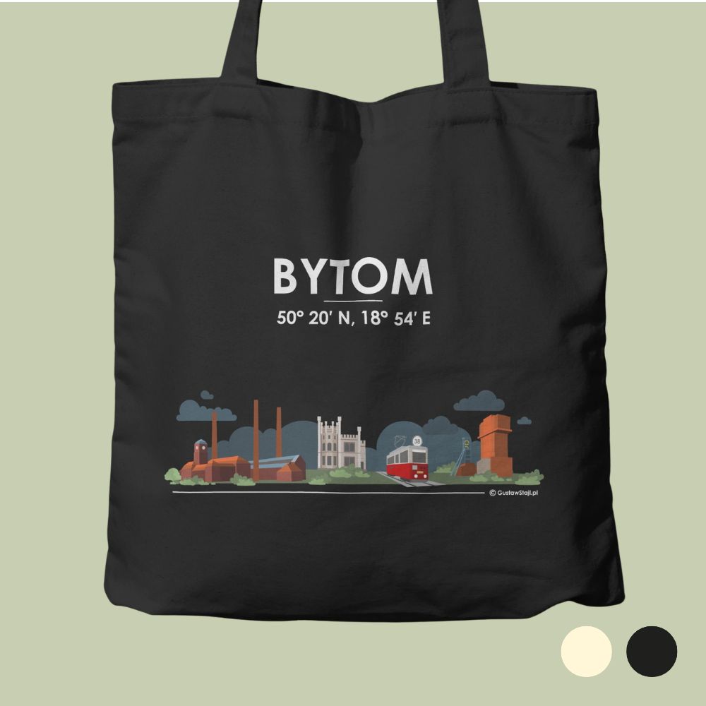 Czarna bawełniana torba ułożona płasko na oliwkowym tle. Na środku umieszczono biały napis „BYTOM” oraz pod nim współrzędne geograficzne „50° 20' N, 18° 54' E”. Na dole torby znajduje się kolorowa ilustracja panoramiczna przedstawiająca charakterystyczne obiekty Bytomia, w tym Elektrociepłownię Szombierki, neogotycki budynek oraz czerwony tramwaj linii 38. W prawym dolnym rogu widoczne są dwa okręgi oznaczające opcje kolorystyczne: kremową i czarną.